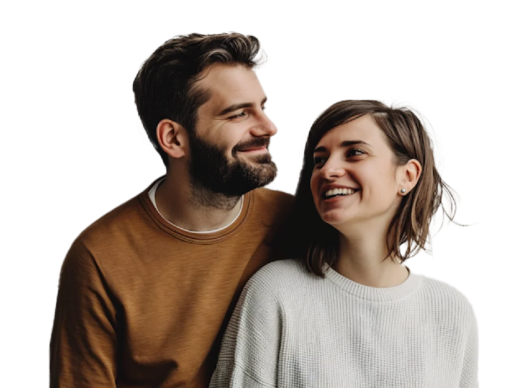 A couple smiling over their shoulders at each other